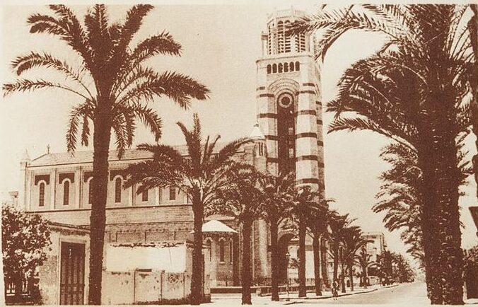 800px-PORT_SAID_-_The_French_Cathedral_and_Kitchner_Street_n.d._-_front_-_TIMEA-e1639066613232.jpg